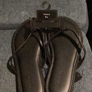 Torrid Black Sandals with Sleek Design